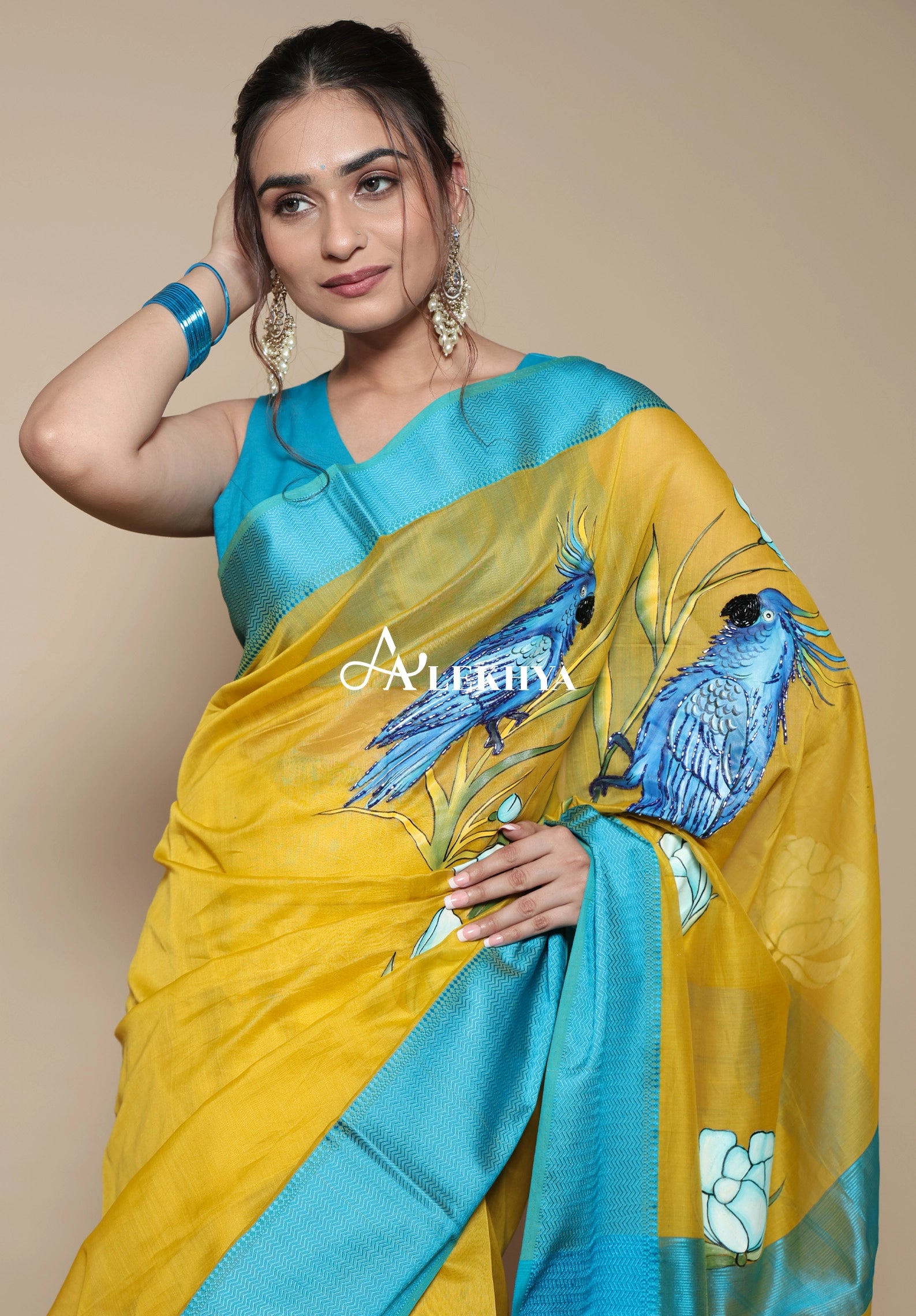 Macaw Majesty- Maheshwari Handloom Saree