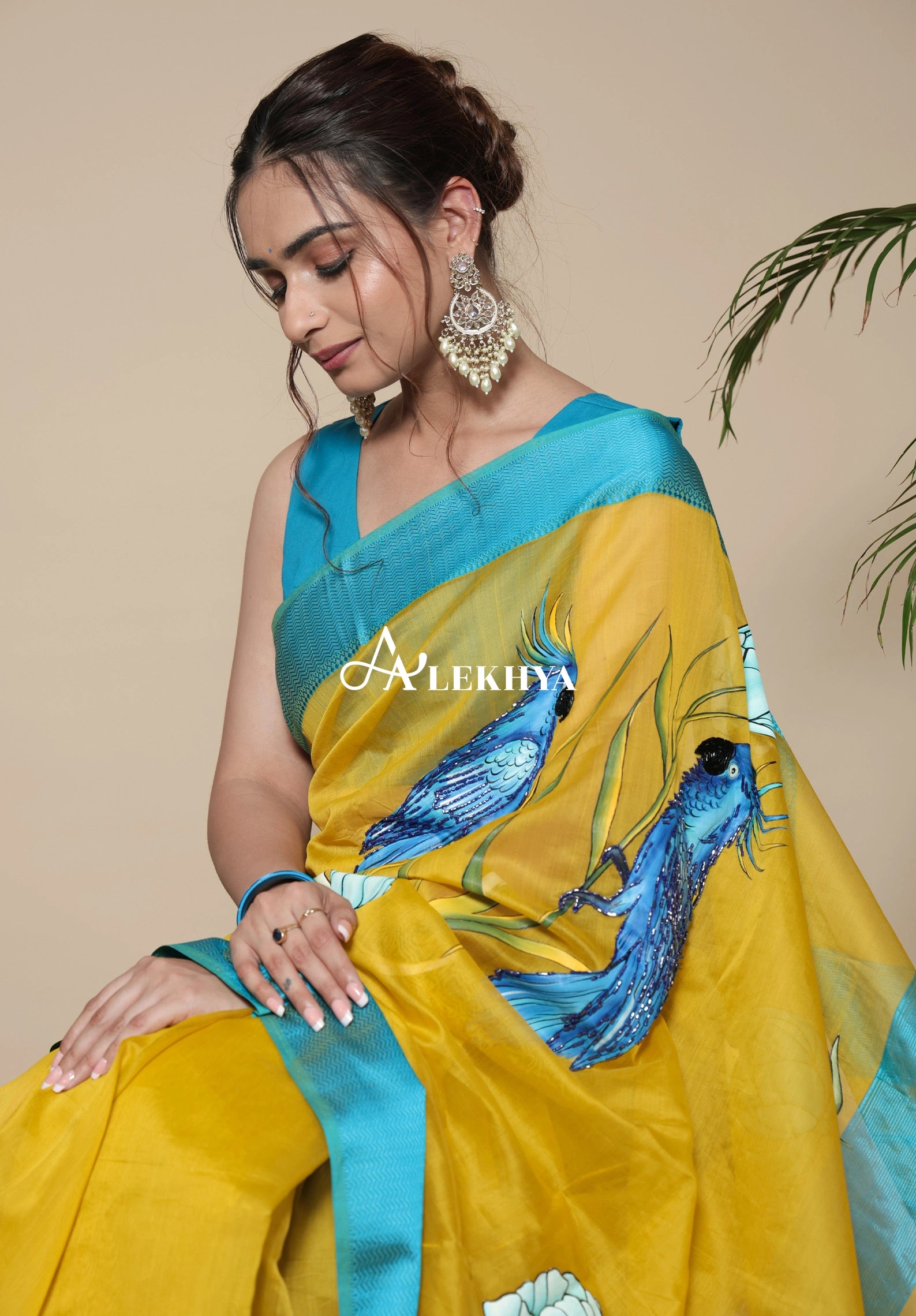 Macaw Majesty- Maheshwari Handloom Saree